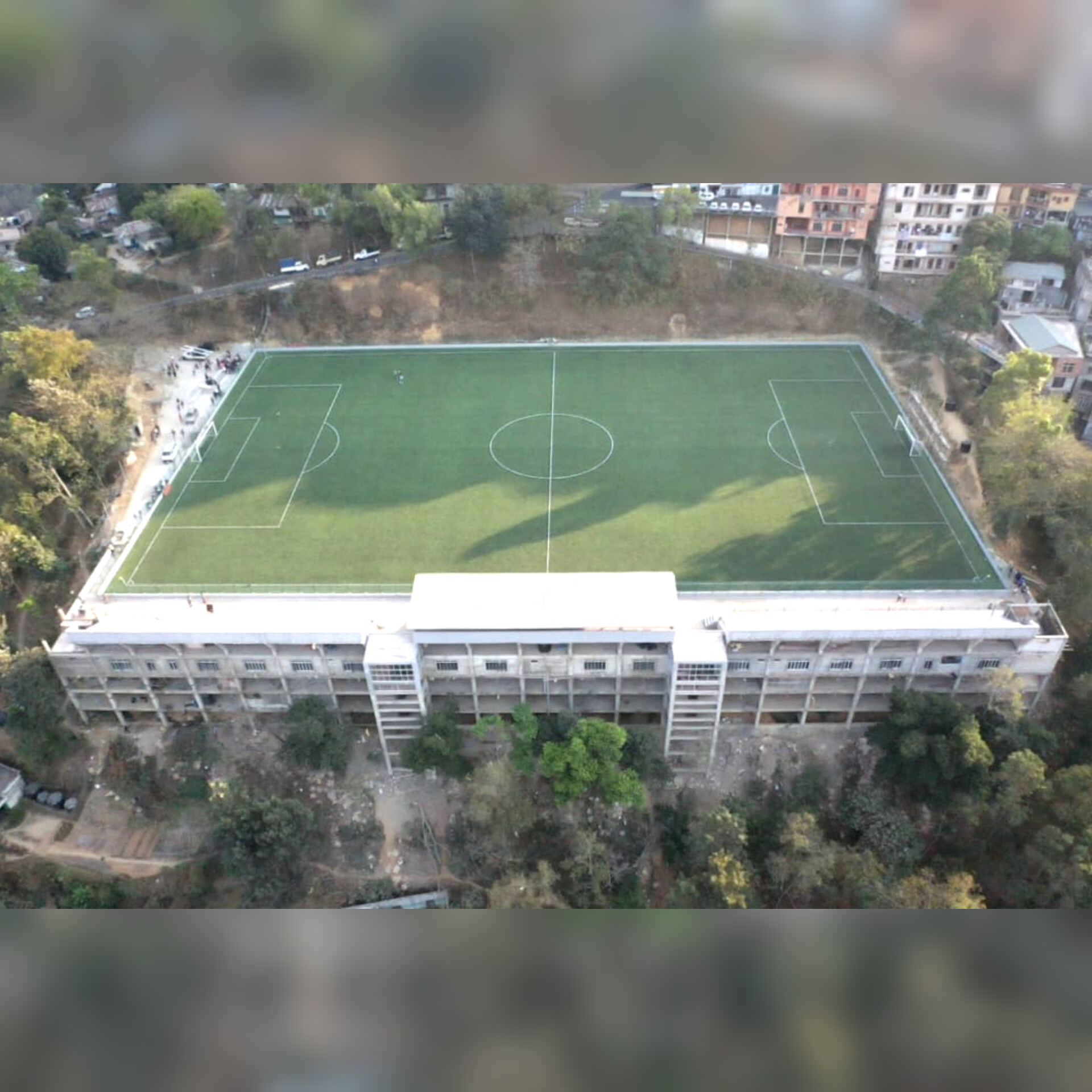 Photo-3 Aerial view showing RCC structure and synthetic turf