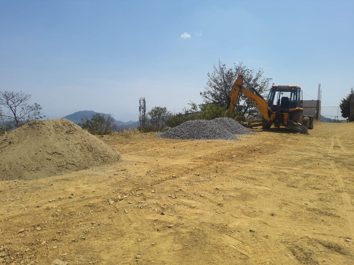 Levelling of work site by mechnical means and procurement of materials like stone aggregate etc. to work site (in progress) as on Dt 15.4.2024